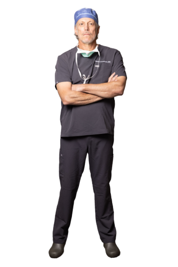 Dr. Pearlman in scrubs without face mask