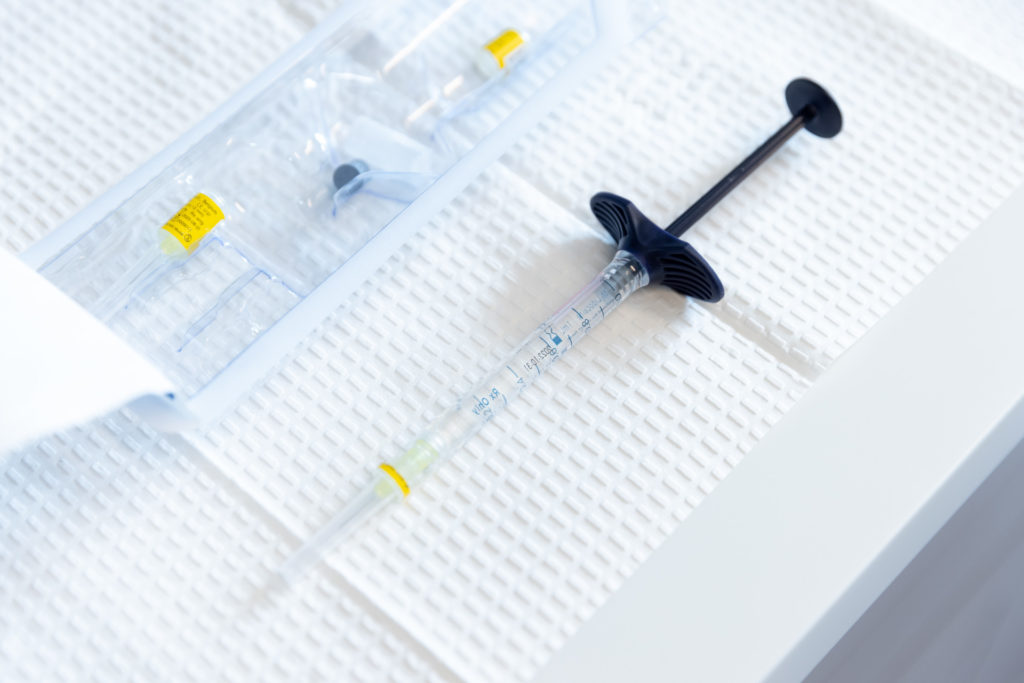 Injection needles on sterile paper