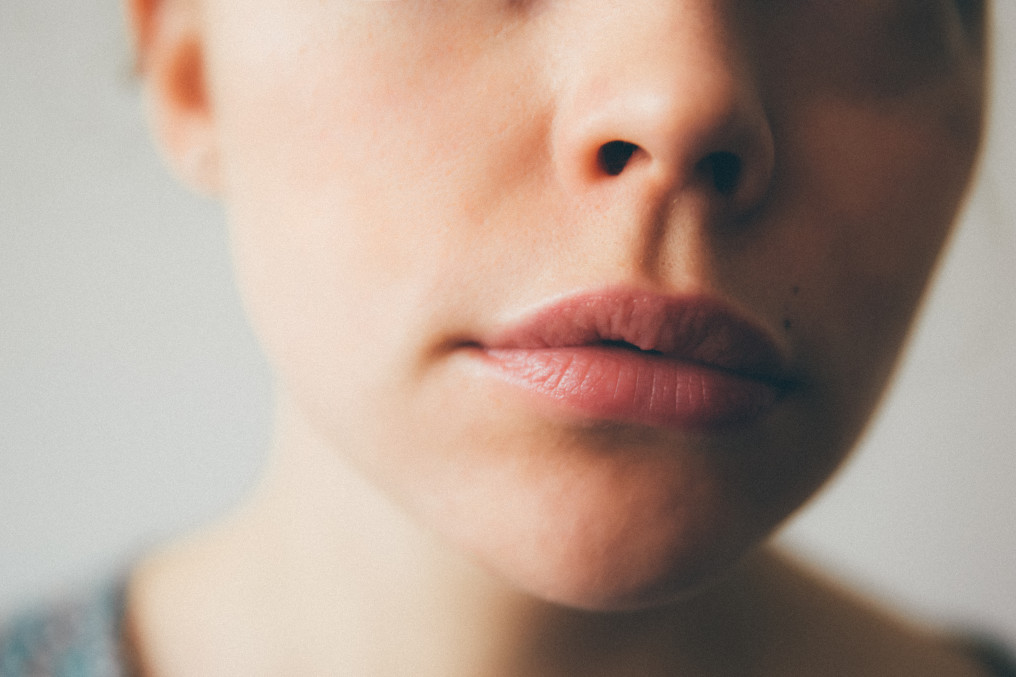 up close of woman's plump lips